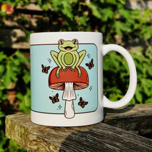 Load image into Gallery viewer, Cheerful Frog with Brown Mushrooms and Butterflies | Mushroom Pals | Ceramic Mug - Scaredy Cat Studio
